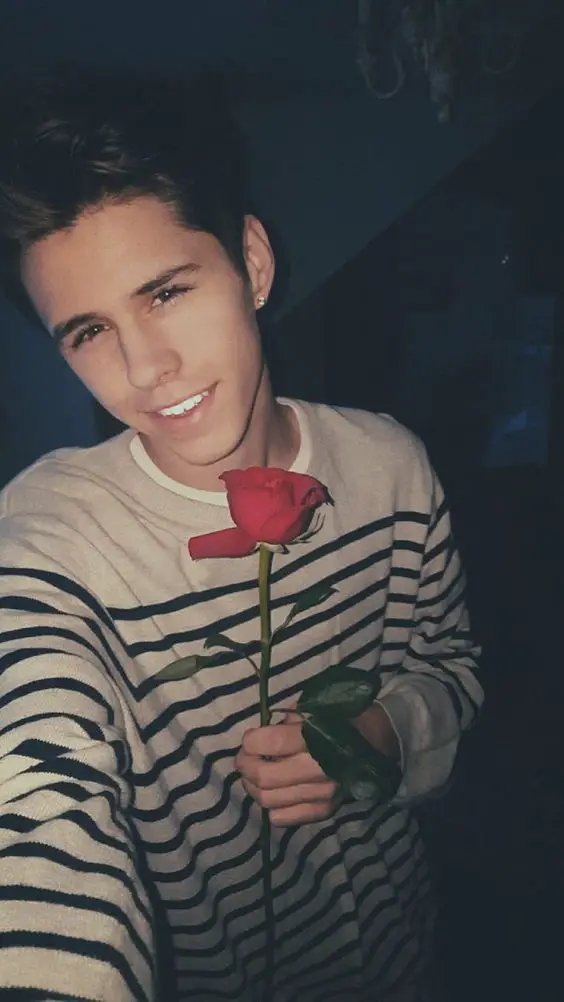 Jackson Krecioch With A Rose In His Hand