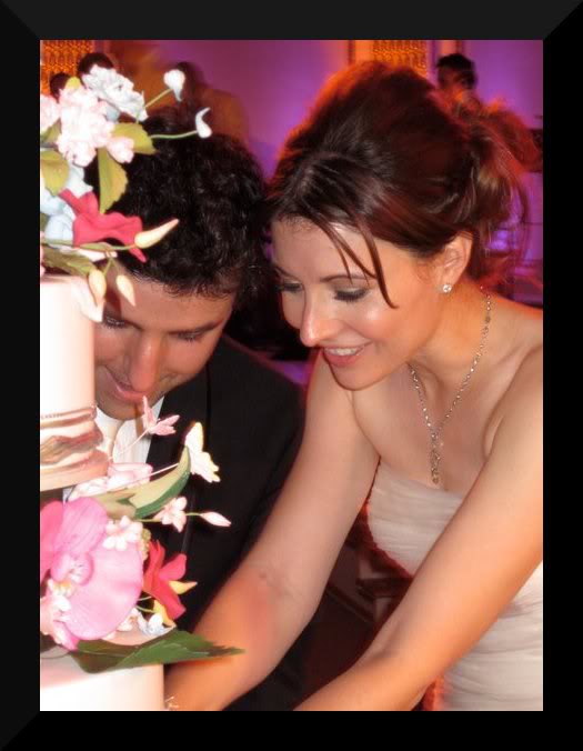 Vanessa Britting Cutting Wedding Cake