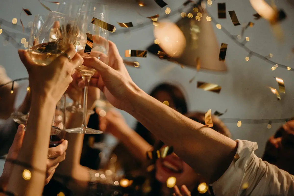 Friends Toasting With Champagne Glasses