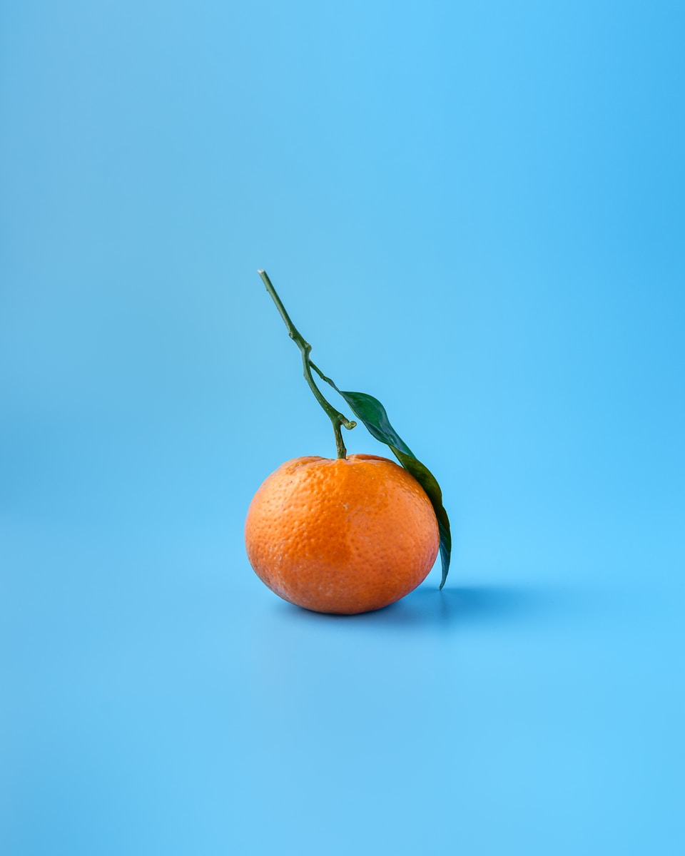 orange on blue background