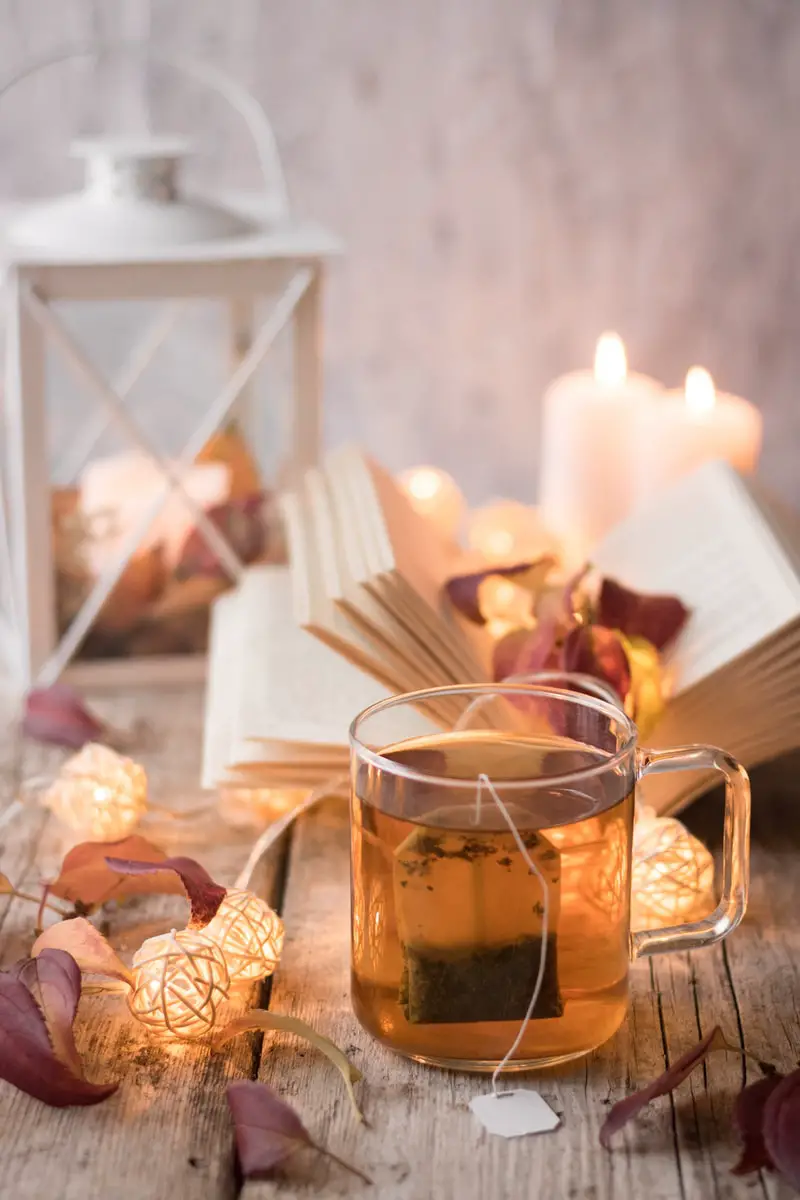 glass mug filled with tea