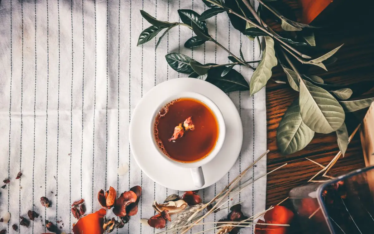 rose tea served in a white cup