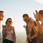 friends laughing at funny icebreaker questions