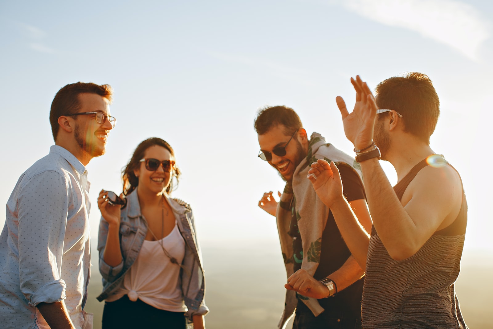 friends laughing at funny icebreaker questions