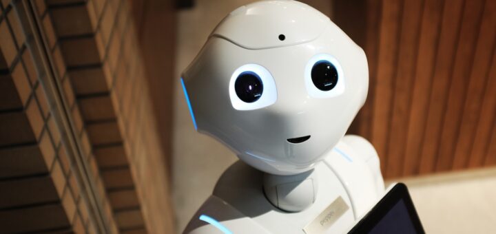 friendly artificial intelligence robot standing near wall