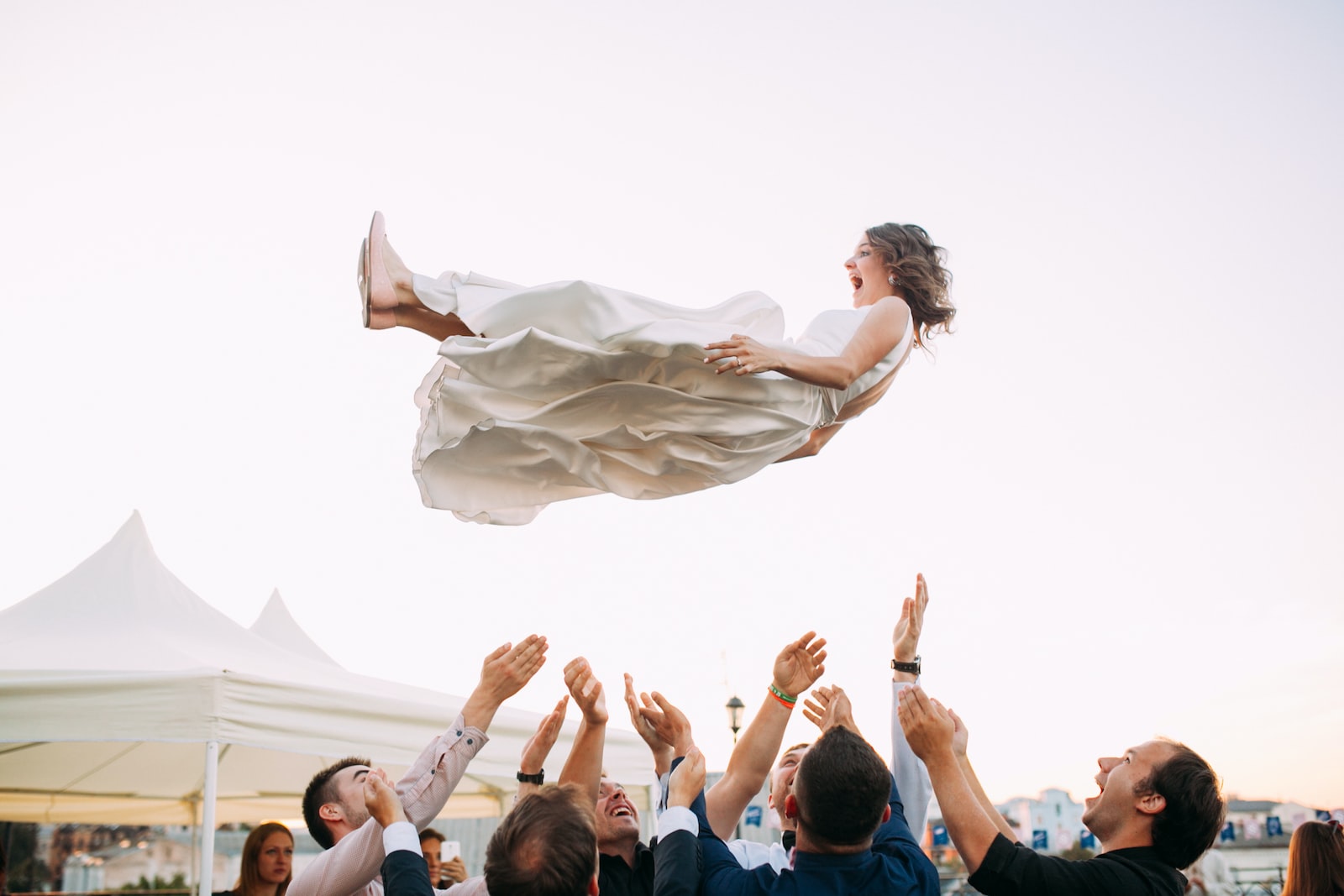 screaming woman in wedding dress in the air